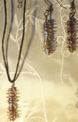 Parure cages violettes longues boucles d'oreilles et collier à 5 euro